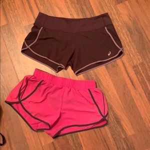 A bundle of Aasics running shorts